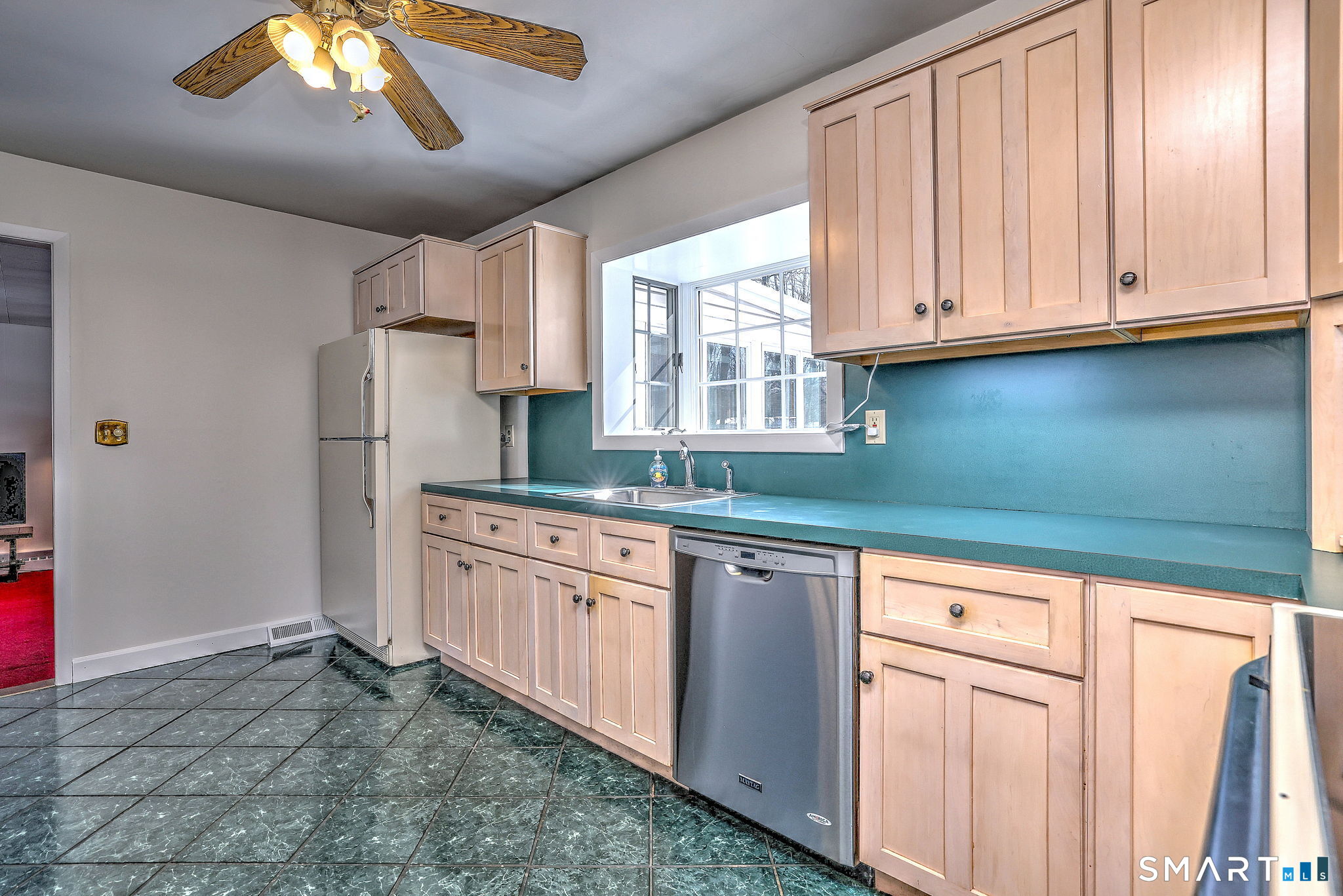 30 Crestview Terrace Wallingford, CT 06492 - Photo 10 of 32 a kitchen with granite countertop white cabinets and white appliances