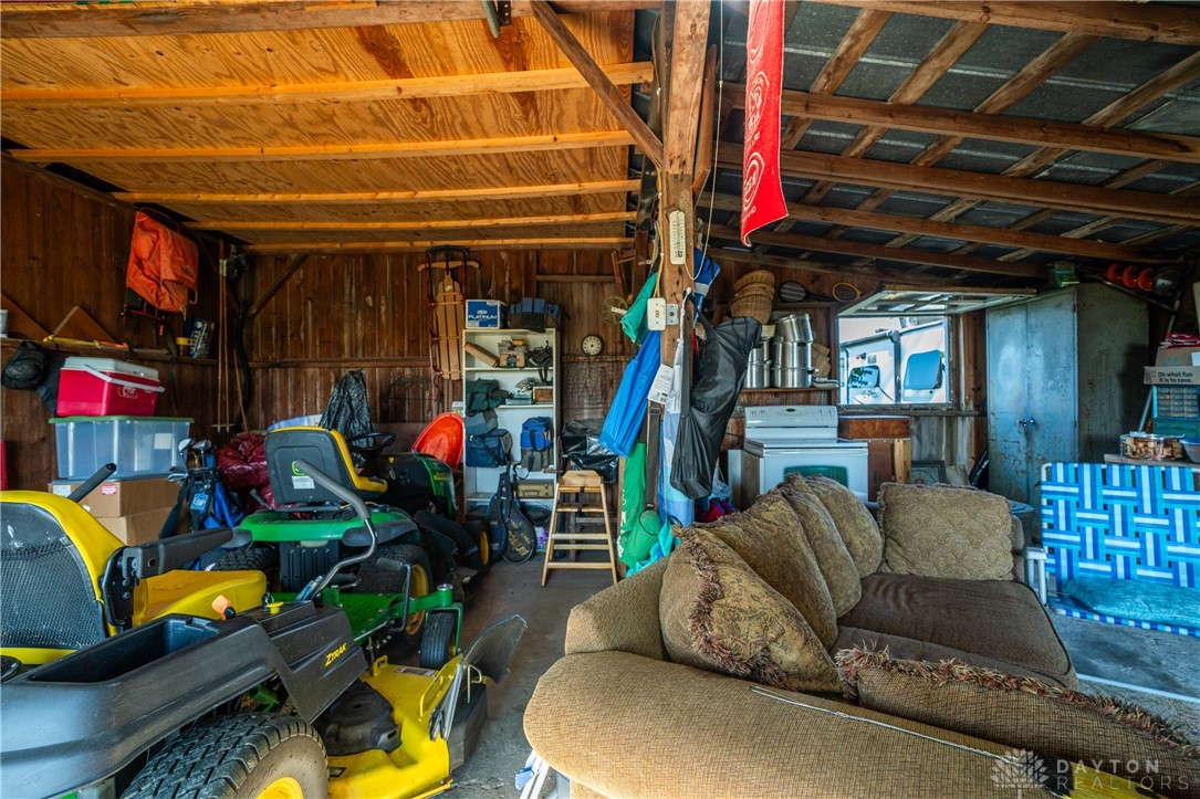 1599 Garringer Road Jamestown, OH 45335 - Photo 61 of 73 A rustic space combining storage and a lounge area, offering versatile utility.
