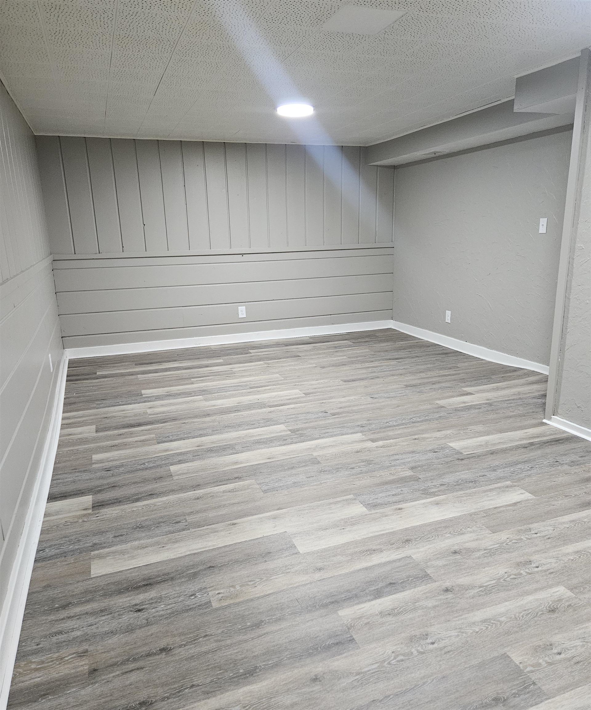 3216 North Winnebago Street Rockford, IL 61103 - Photo 16 of 18 a view of empty room with wooden floor
