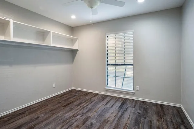 a bathroom with a shower and a sink