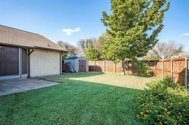 a backyard of a house with seating space