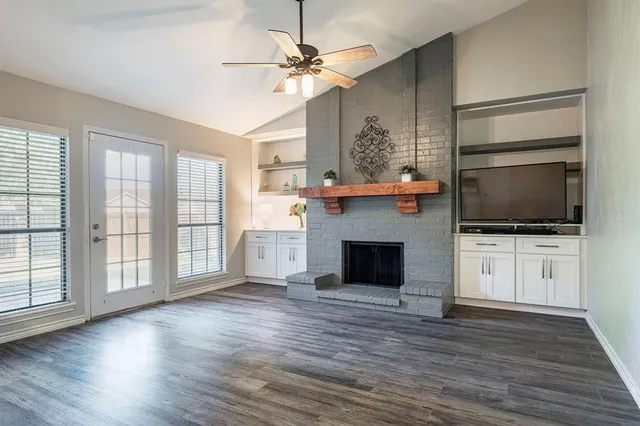 a kitchen with a sink and chandelier