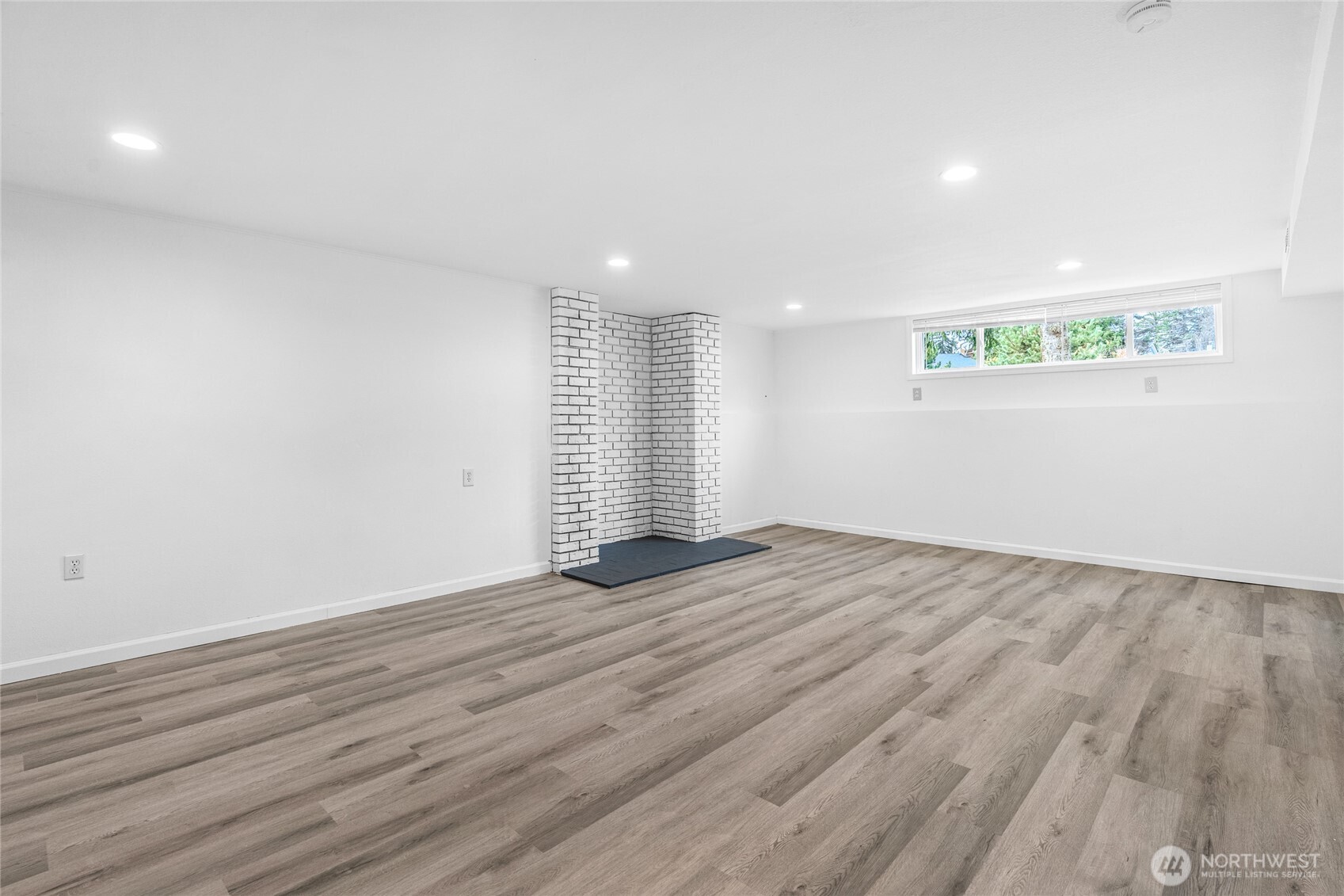 12703 Southeast 163rd Street Renton, WA 98058 - Photo 16 of 21 an empty room with wooden floor