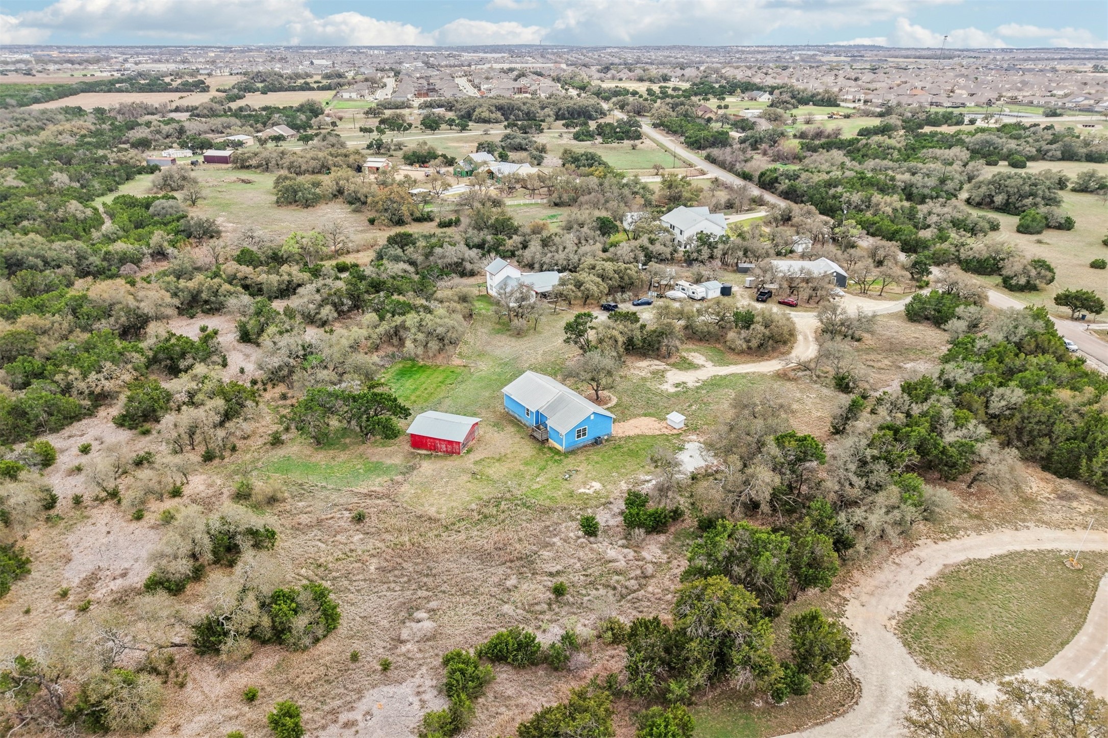 1470 Oak Grove Road Leander, TX 78641 - Photo 33 of 38 an aerial view of a houses with a yard