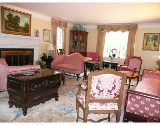 217 Dilworth Road Bell Acres, PA 15143 - Photo 3 of 17 Living Room. Five windows bring lots of light into the room. The fireplace surround is marbled slate.