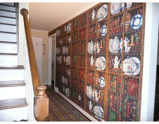 217 Dilworth Road Bell Acres, PA 15143 - Photo 4 of 17 Other. Architectural wallpaper adds dimension the the main hallway, which leads to a wet bar, coat closet and dining room.