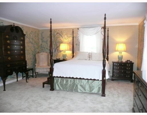 217 Dilworth Road Bell Acres, PA 15143 - Photo 10 of 17 Master Bedroom. Chinese mural wallpaper and new carpeting in the master. In addition to the double-rodded bedroom closet, the hallway leading to the en suite bath has a walk-in closet and an 11-foot closet of shelving.
