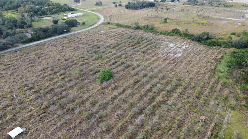 7630 Lake Buffum Road North Lake Wales, FL 33859 - Photo 13 of 14 a view of a road with a yard