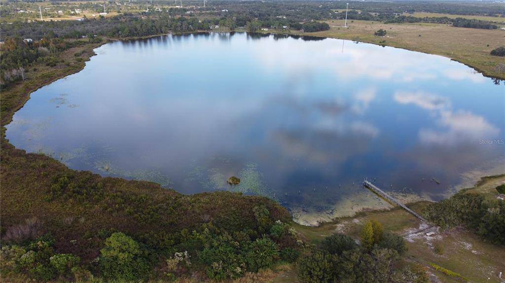 7630 Lake Buffum Road North Lake Wales, FL 33859 - Photo 3 of 14 a view of lake with green space