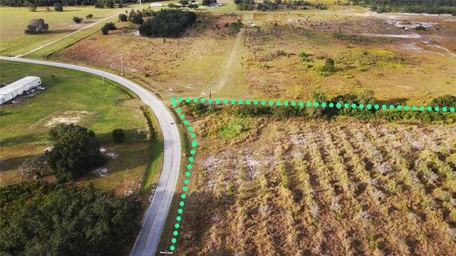a view of swimming pool with a garden