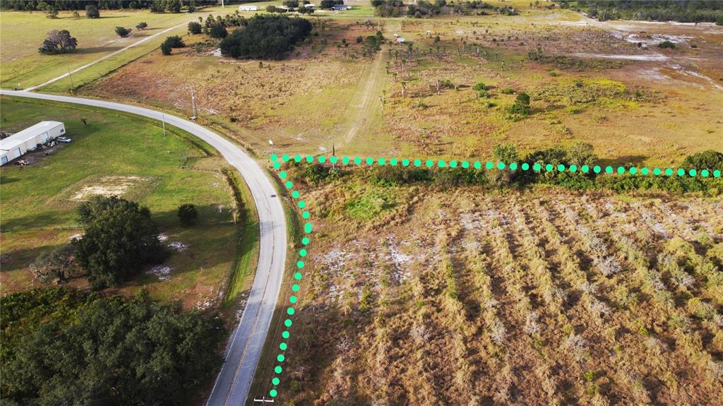 7630 Lake Buffum Road North Lake Wales, FL 33859 - Photo 9 of 14 a view of swimming pool with a garden