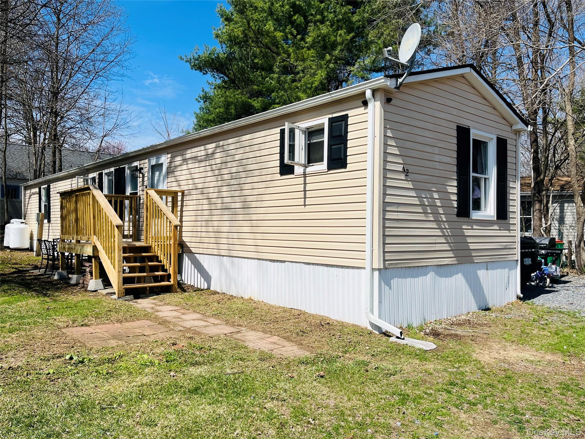 a view of a backyard with a small cabin