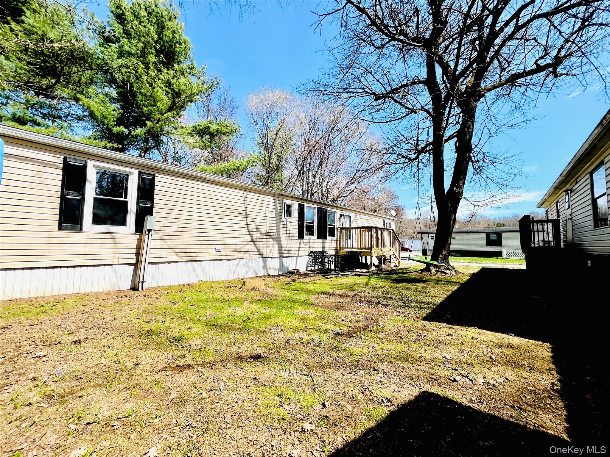 723 Beekman Road, Unit 42 Hopewell Junction, NY 12533 - Photo 3 of 16 a view of a house with snow on the wall