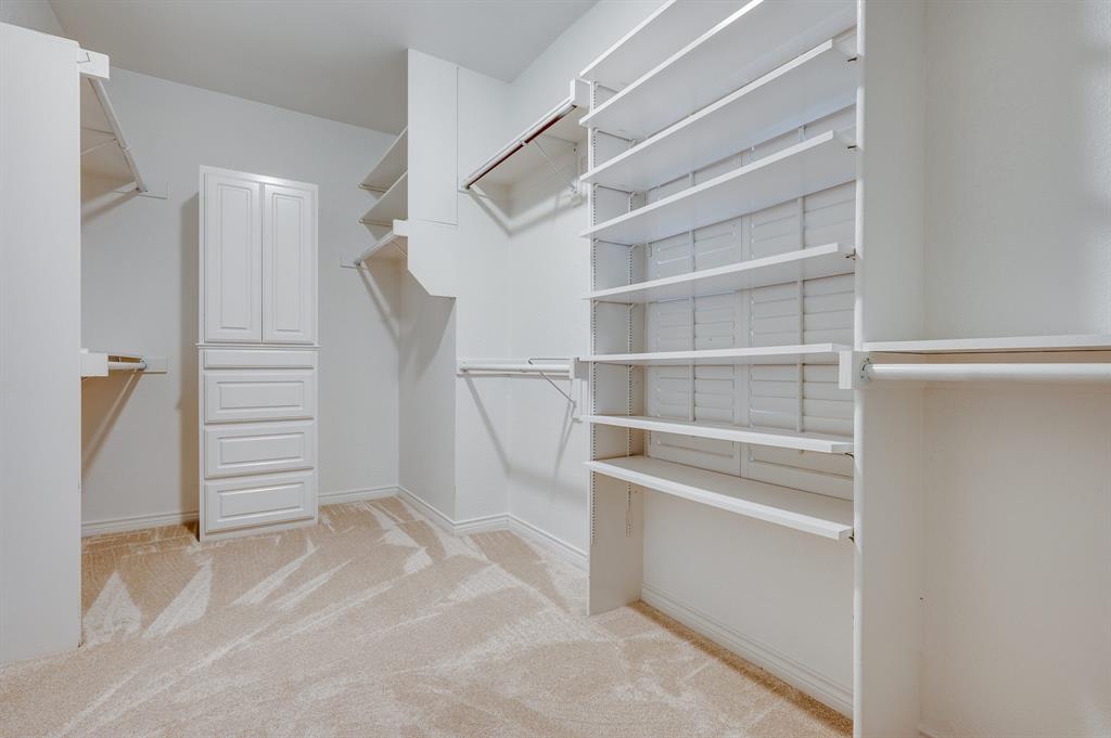 3600 Leighton Ridge Drive Plano, TX 75025 - Photo 15 of 38 a view of walk in closet with empty racks