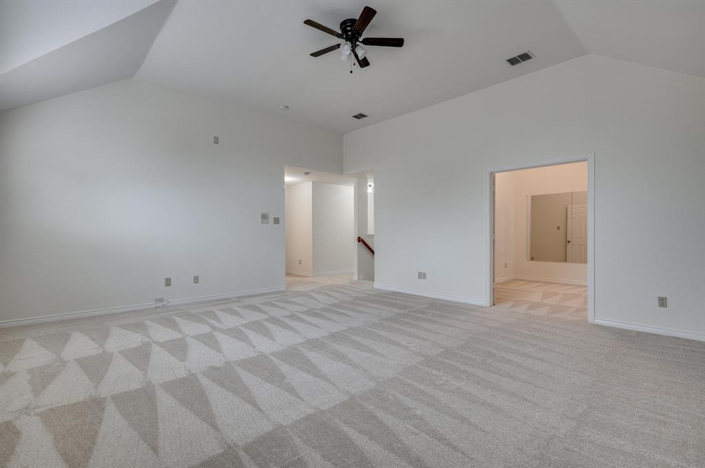 3600 Leighton Ridge Drive Plano, TX 75025 - Photo 26 of 38 a view of a livingroom with a ceiling fan and window
