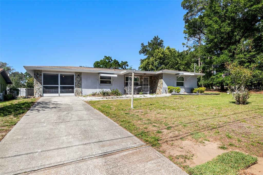 front view of a house with a patio