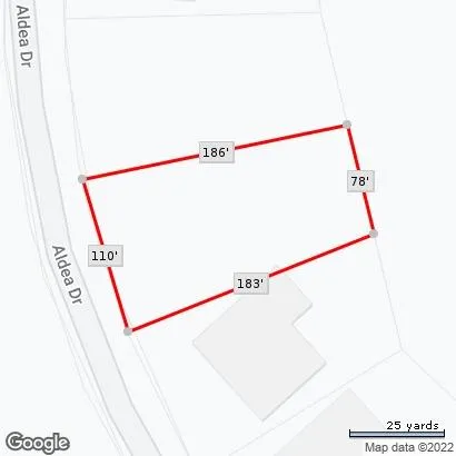 a bathroom with a shower and a mirror