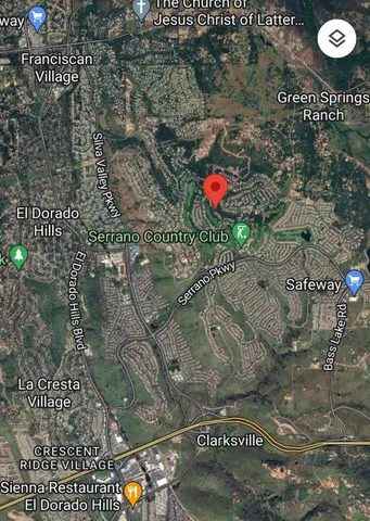 a view of a swimming pool with an outdoor seating