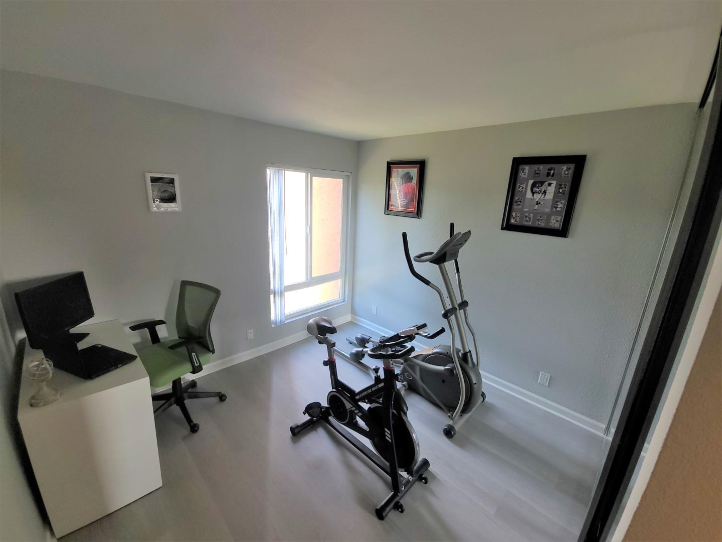 424 Dempsey Road, Unit 227 Milpitas, CA 95035 - Photo 12 of 24 a view of a workspace with gym equipment