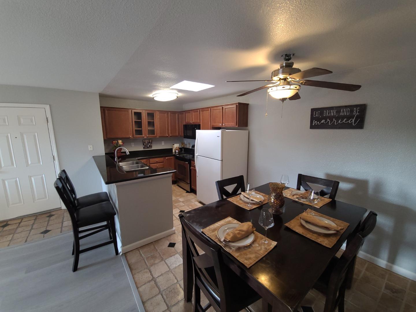 424 Dempsey Road, Unit 227 Milpitas, CA 95035 - Photo 10 of 24 a view of a dining room with furniture