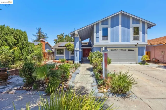 a front view of house with yard