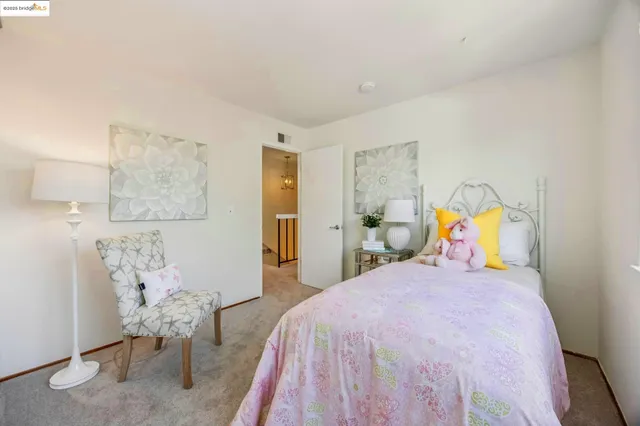 a bathroom with a sink mirror and vanity