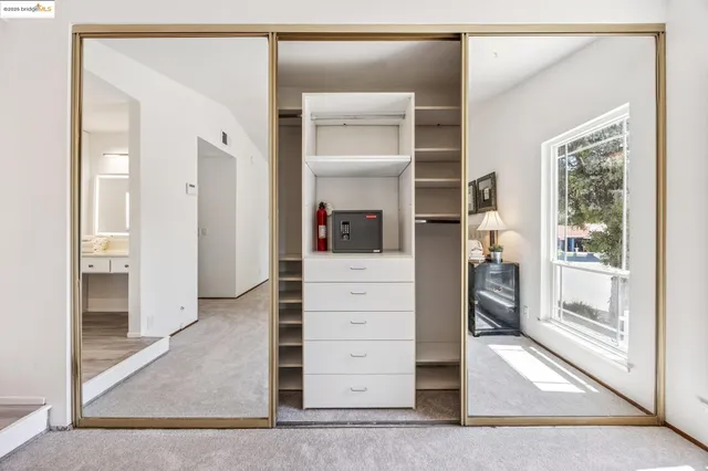 swimming pool view with a seating space