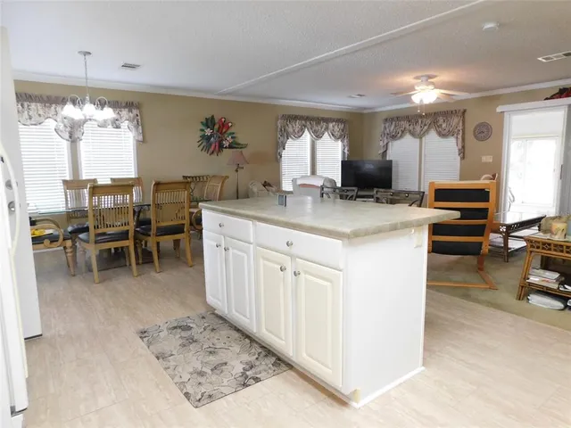 a view of kitchen center island and living room