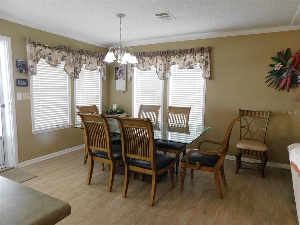 11739 Southwest Lemon Avenue Arcadia, FL 34269 - Photo 19 of 52 a view of a dining room with furniture window and outside view
