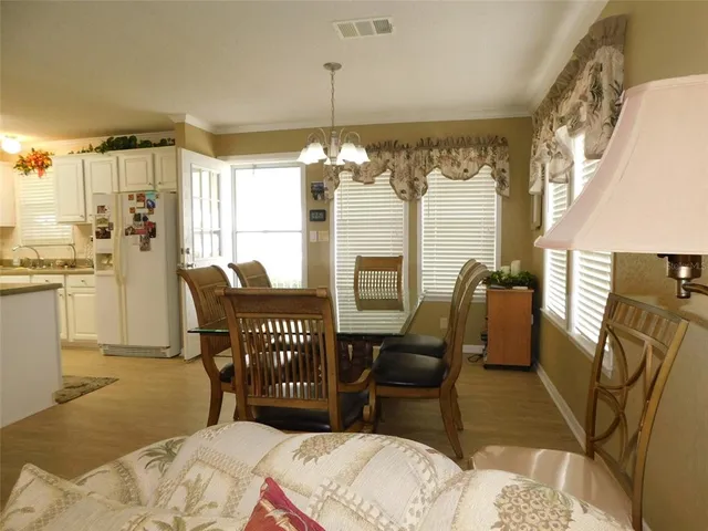 a bedroom with furniture and a bed