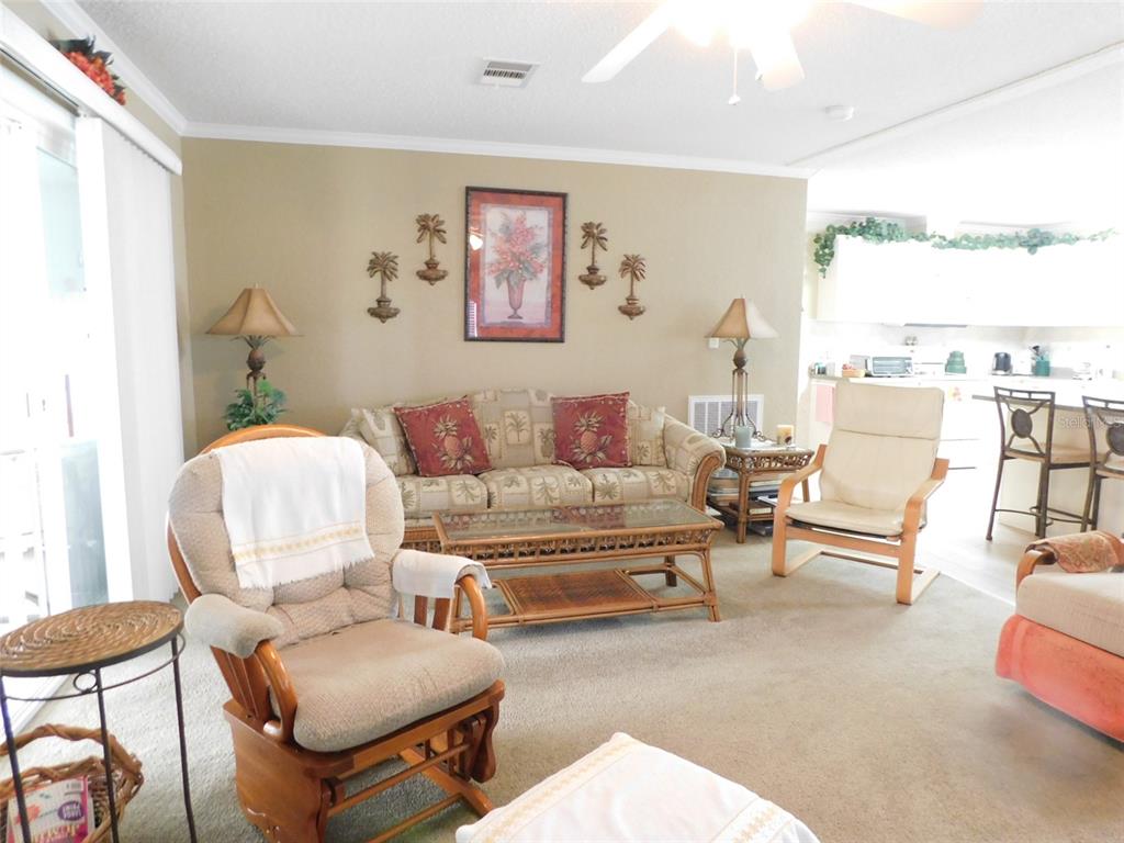 11739 Southwest Lemon Avenue Arcadia, FL 34269 - Photo 7 of 52 a living room with furniture and a large window