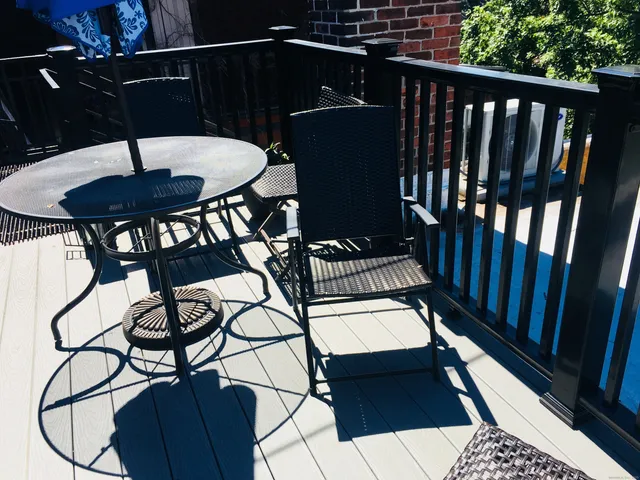 a view of a balcony having patio