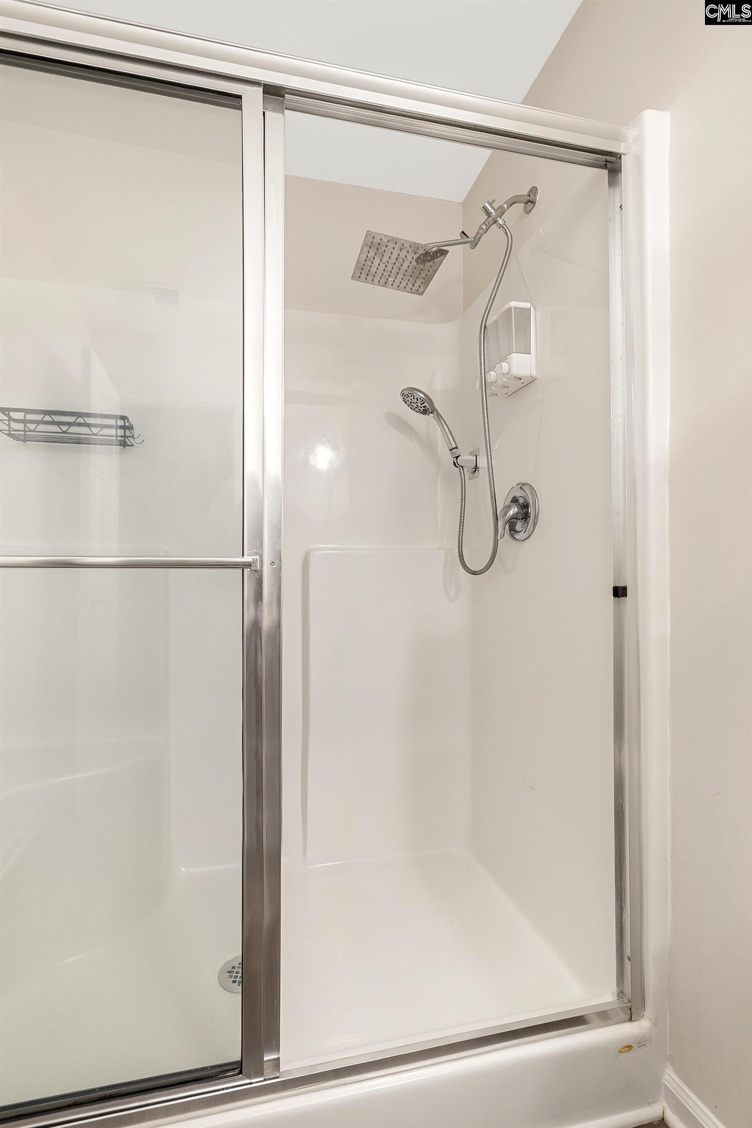 2157 Still Pointe Drive Sumter, SC 29154 - Photo 23 of 25 a bathroom with a glass shower door