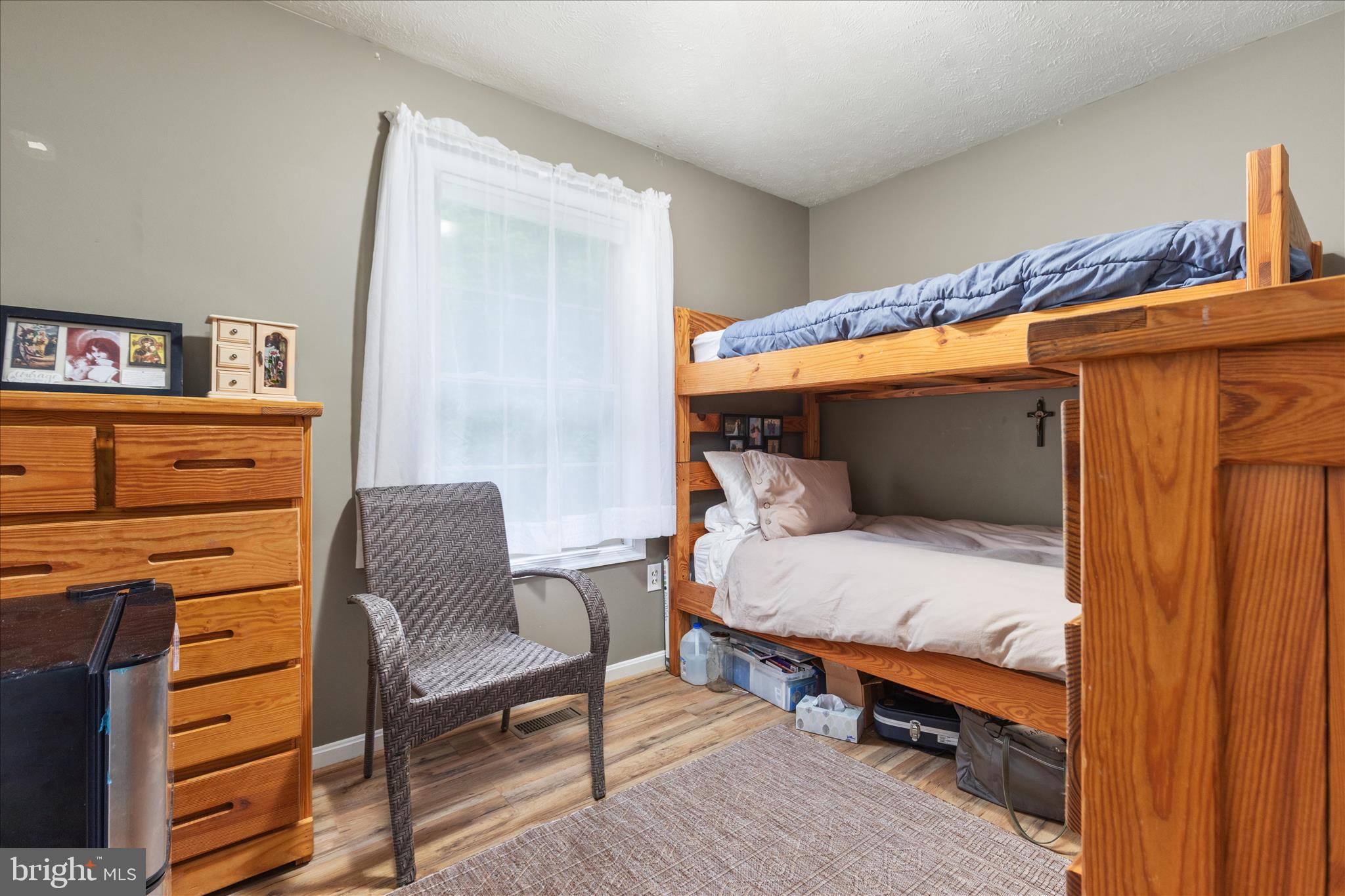 23 Cherrywood Road Front Royal, VA 22630 - Photo 11 of 33 a bedroom with a bed and a dresser in it