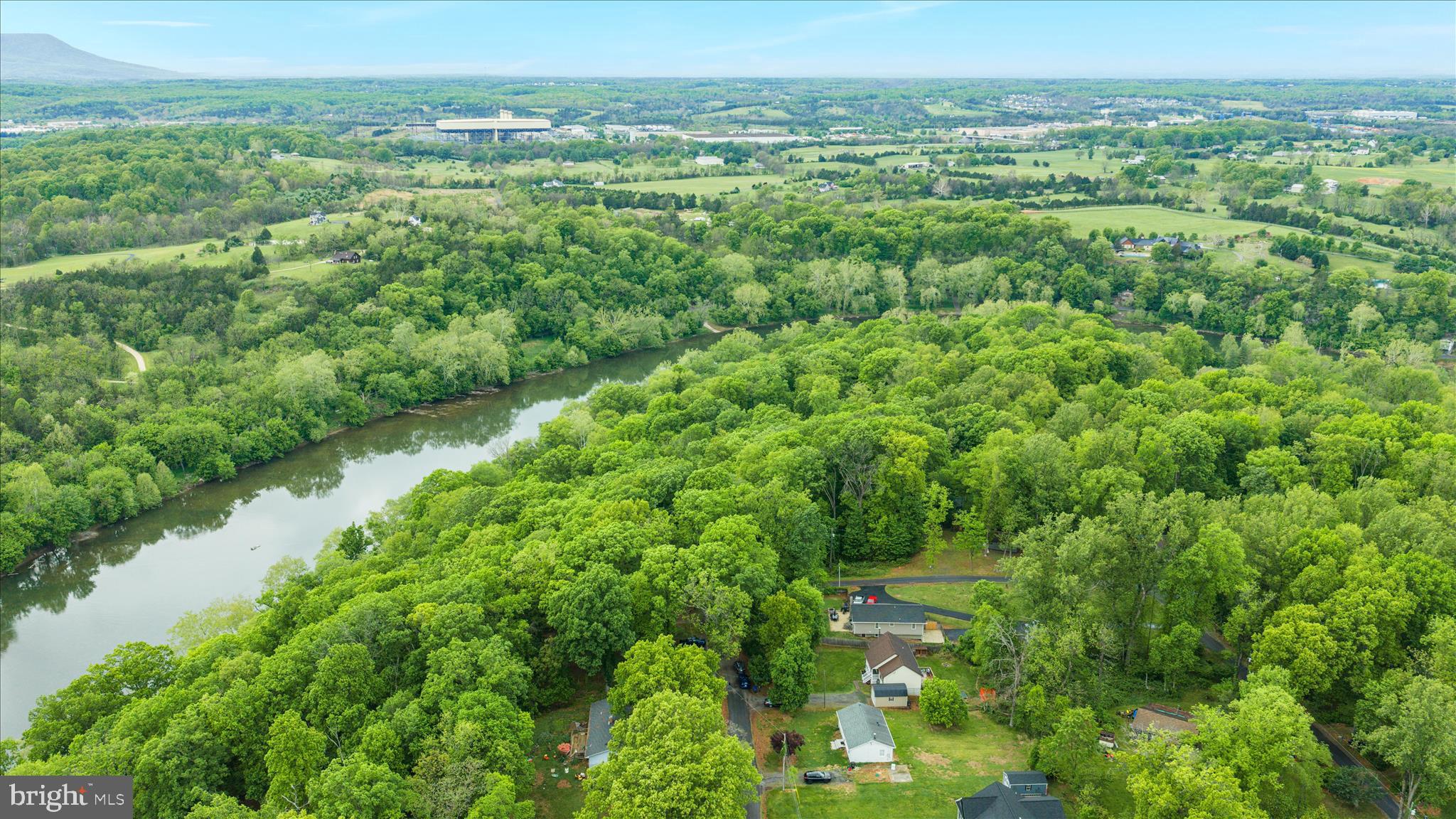 23 Cherrywood Road Front Royal, VA 22630 - Photo 31 of 33 a view of a lush green forest with trees and houses
