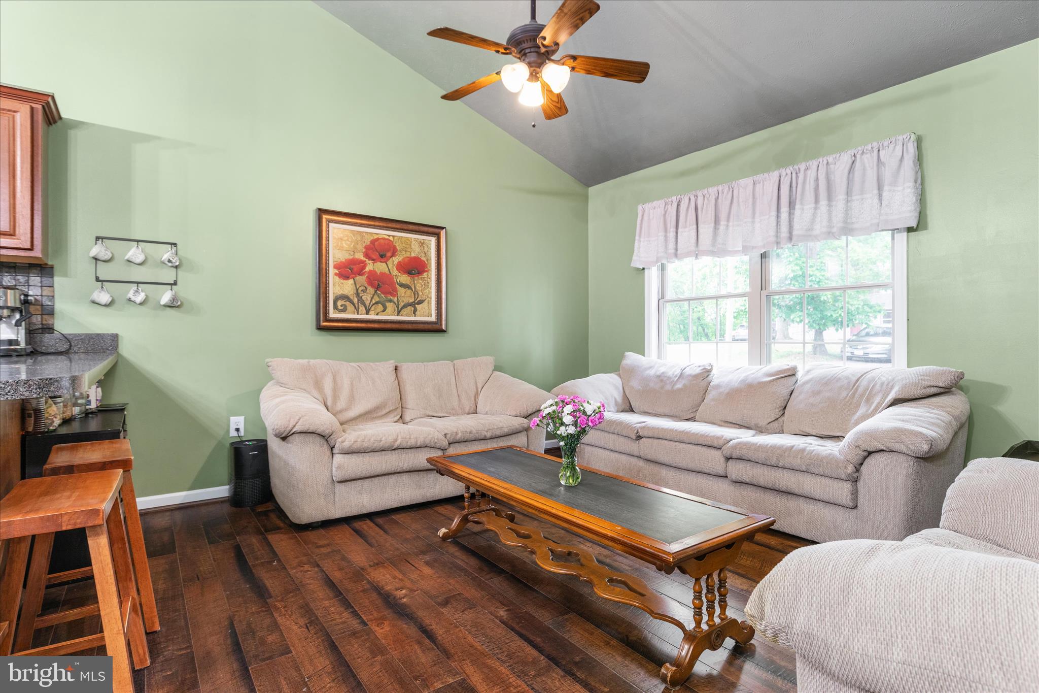 23 Cherrywood Road Front Royal, VA 22630 - Photo 4 of 33 a living room with furniture a large window and a flat screen tv