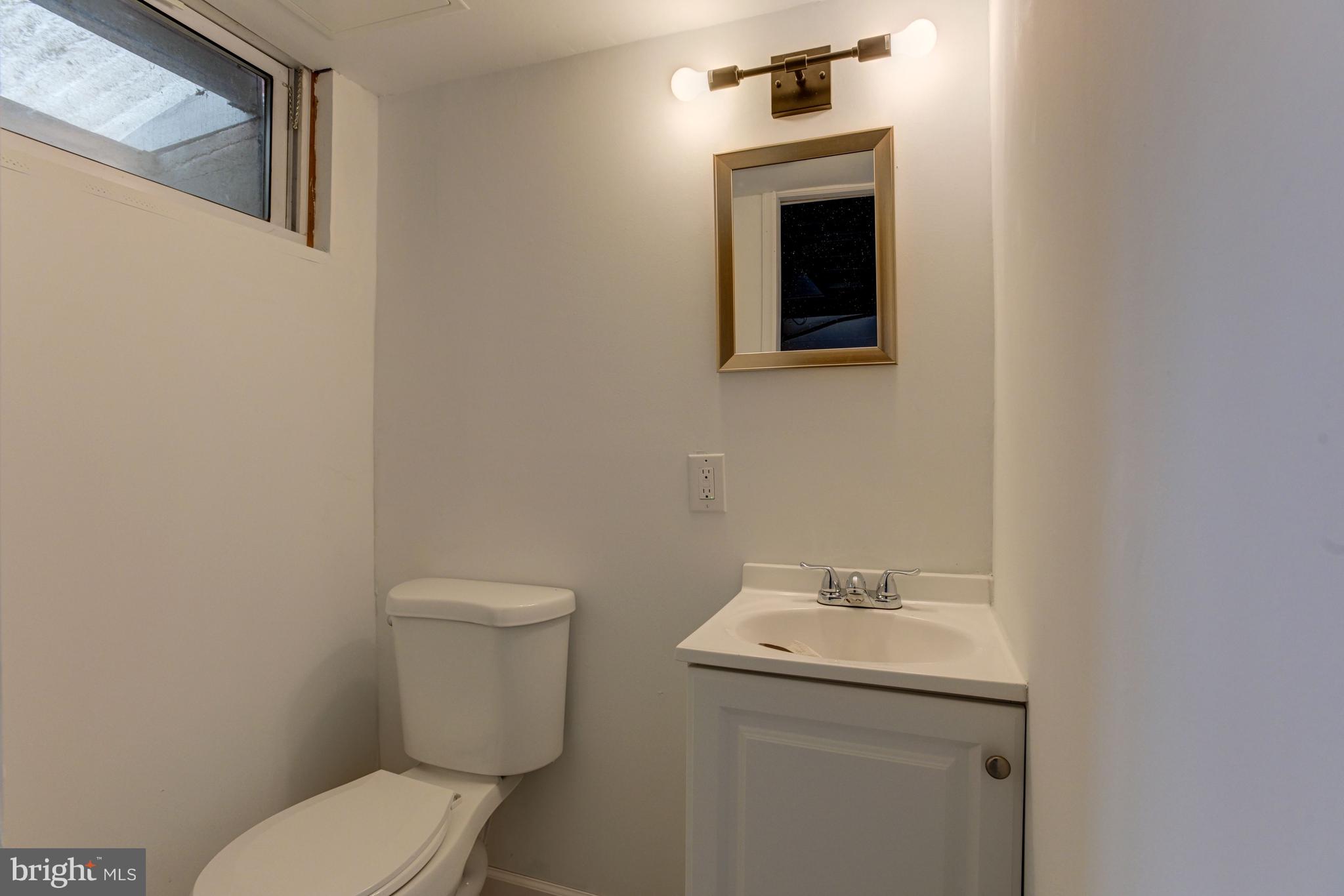 5520 Sagra Road Baltimore, MD 21239 - Photo 31 of 41 Lower Level Powder Room