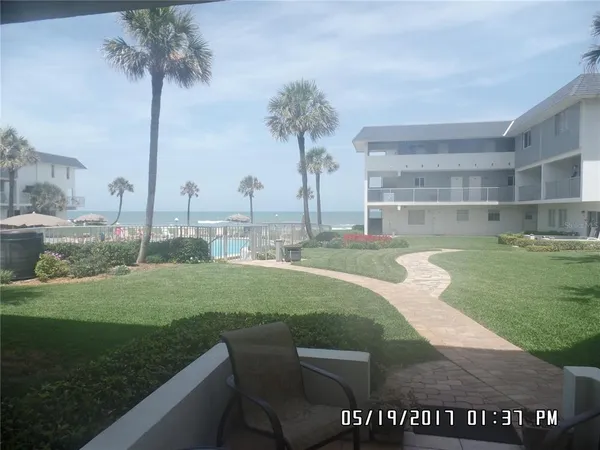 a view of a garden with a slide