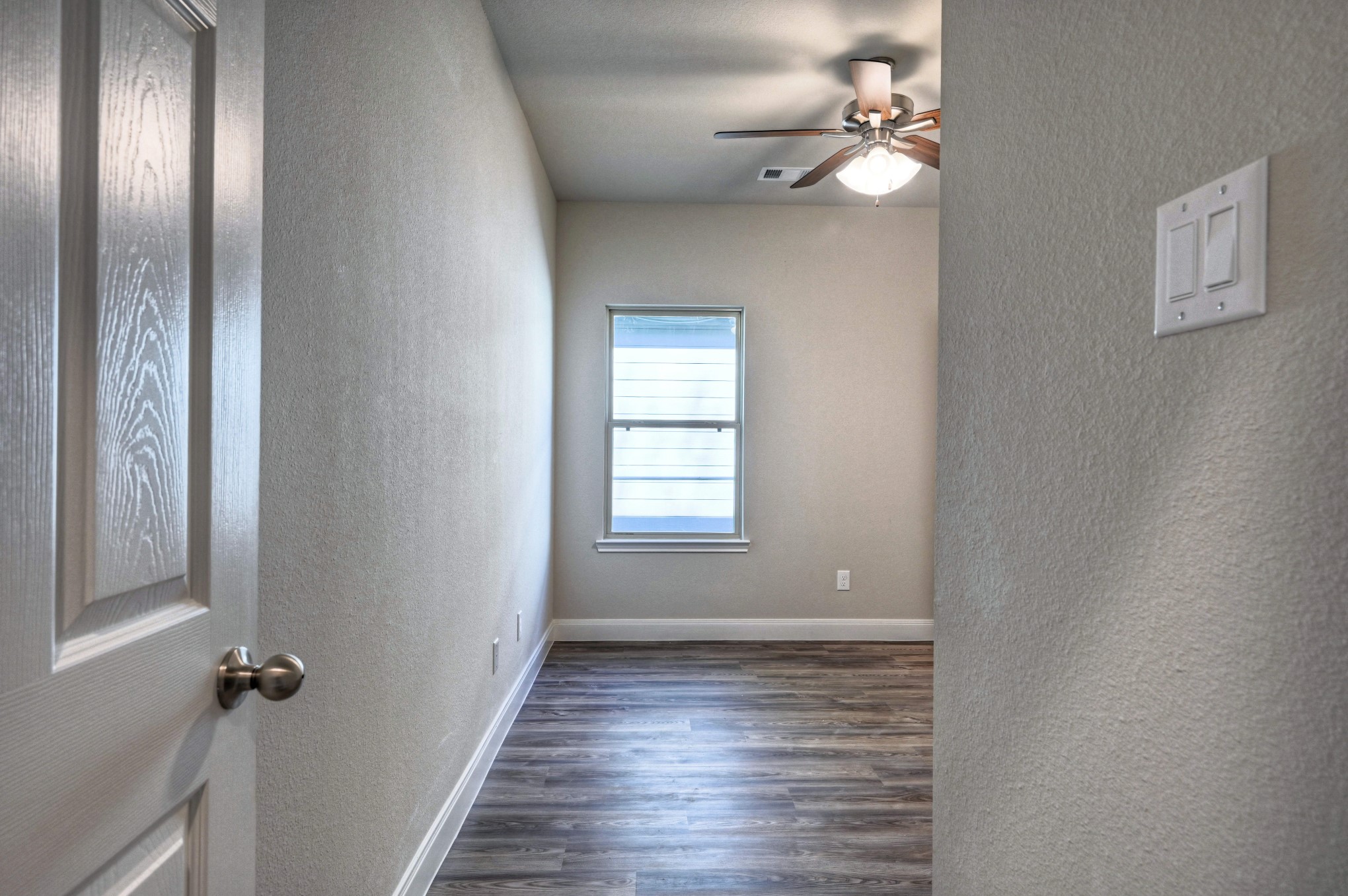 9173 Inwood Willis, TX 77318 - Photo 16 of 31 a view of an empty room with a window