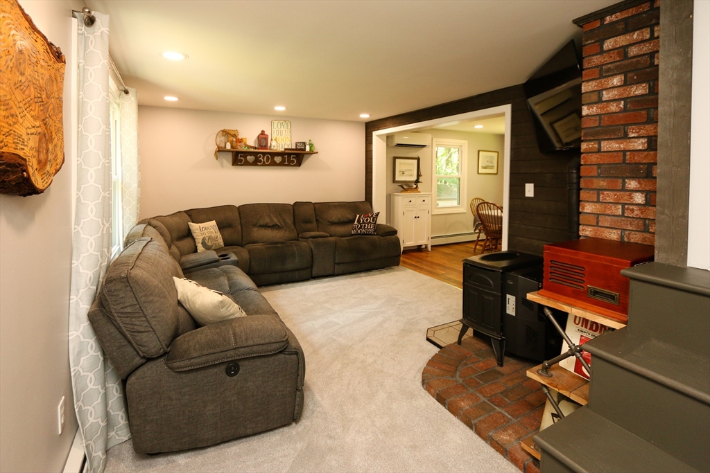 1 Battis Road Merrimac, MA 01860 - Photo 15 of 37 a living room with furniture and wooden floor