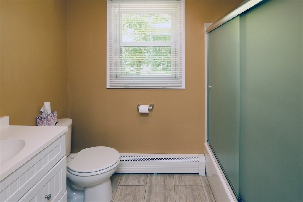 1 Battis Road Merrimac, MA 01860 - Photo 17 of 37 a bathroom with a sink a toilet and a window