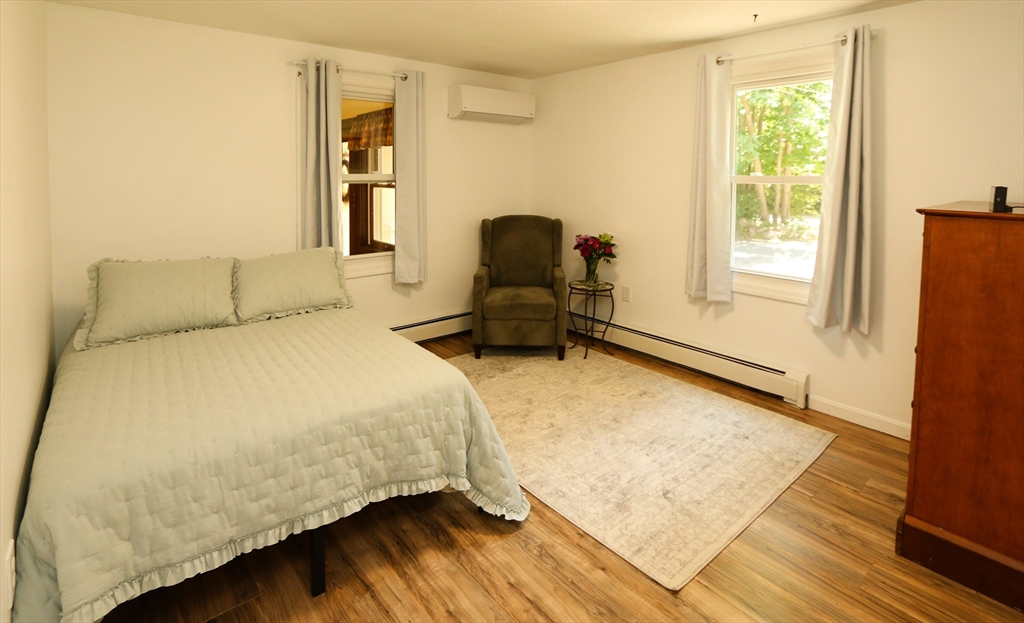 1 Battis Road Merrimac, MA 01860 - Photo 18 of 37 a bedroom with a bed and a window