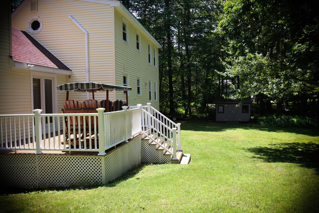 1 Battis Road Merrimac, MA 01860 - Photo 4 of 37 a balcony with yard and outdoor seating