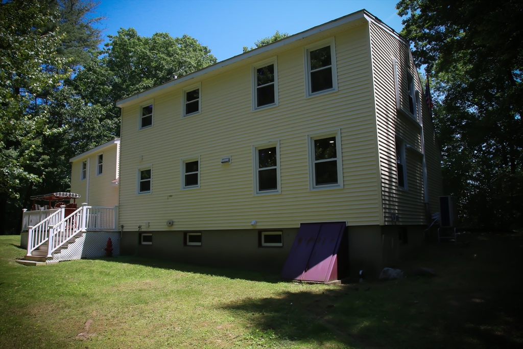 1 Battis Road Merrimac, MA 01860 - Photo 6 of 37 a view of backyard with outdoor seating