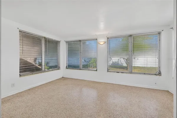 a view of a room with a large window