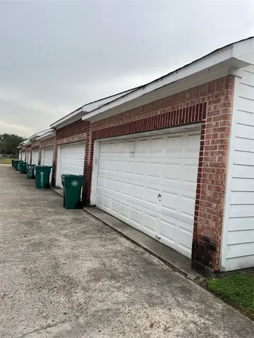 a front view of a house with garage