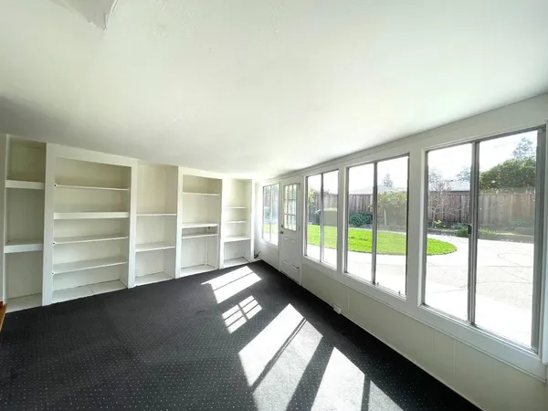 an empty room with windows