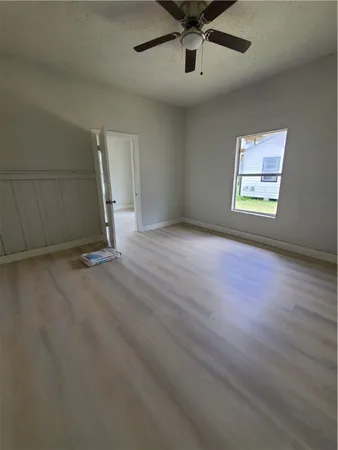 an empty room with windows