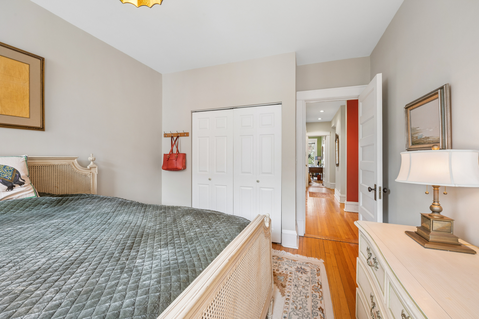 508 Lee Street, Unit 2E Evanston, IL 60202 - Photo 12 of 16 a bedroom with a bed and a couch