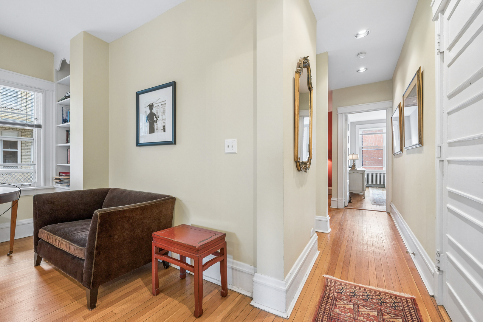 508 Lee Street, Unit 2E Evanston, IL 60202 - Photo 6 of 16 a living room with furniture and a rug
